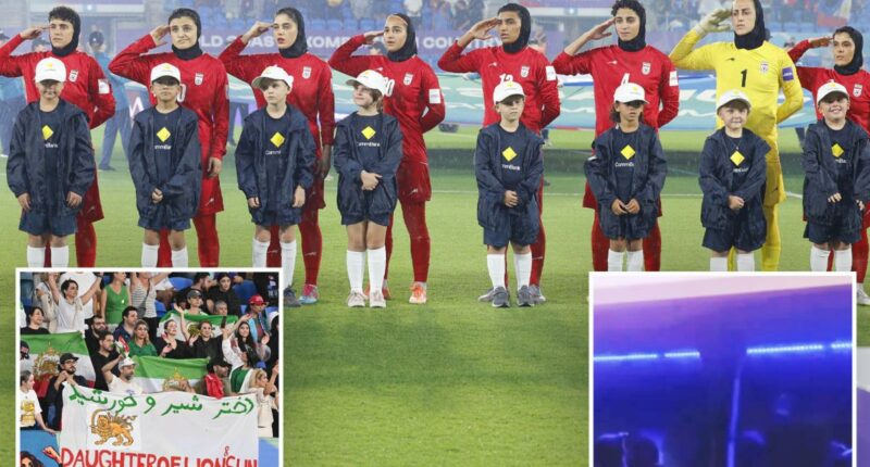 Iranian womenâs soccer players flash 'help' signal after being branded traitors